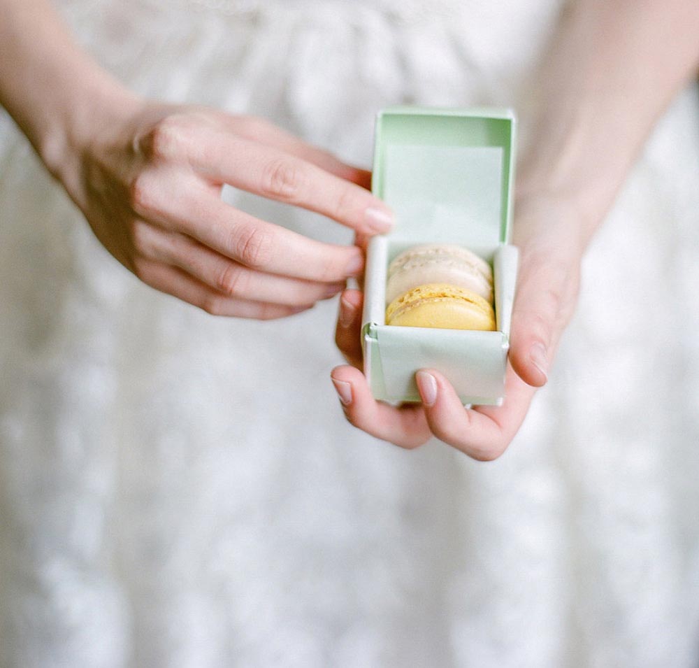 Macarons served in a ring box