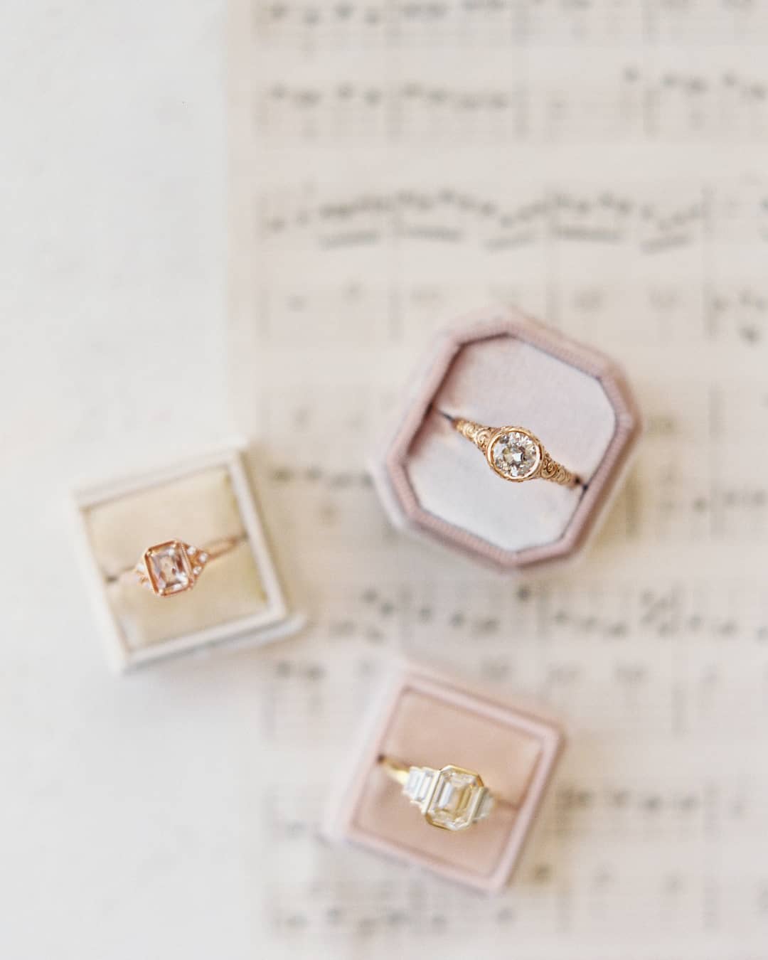 pink velvet ring boxes with vintage engagement rings