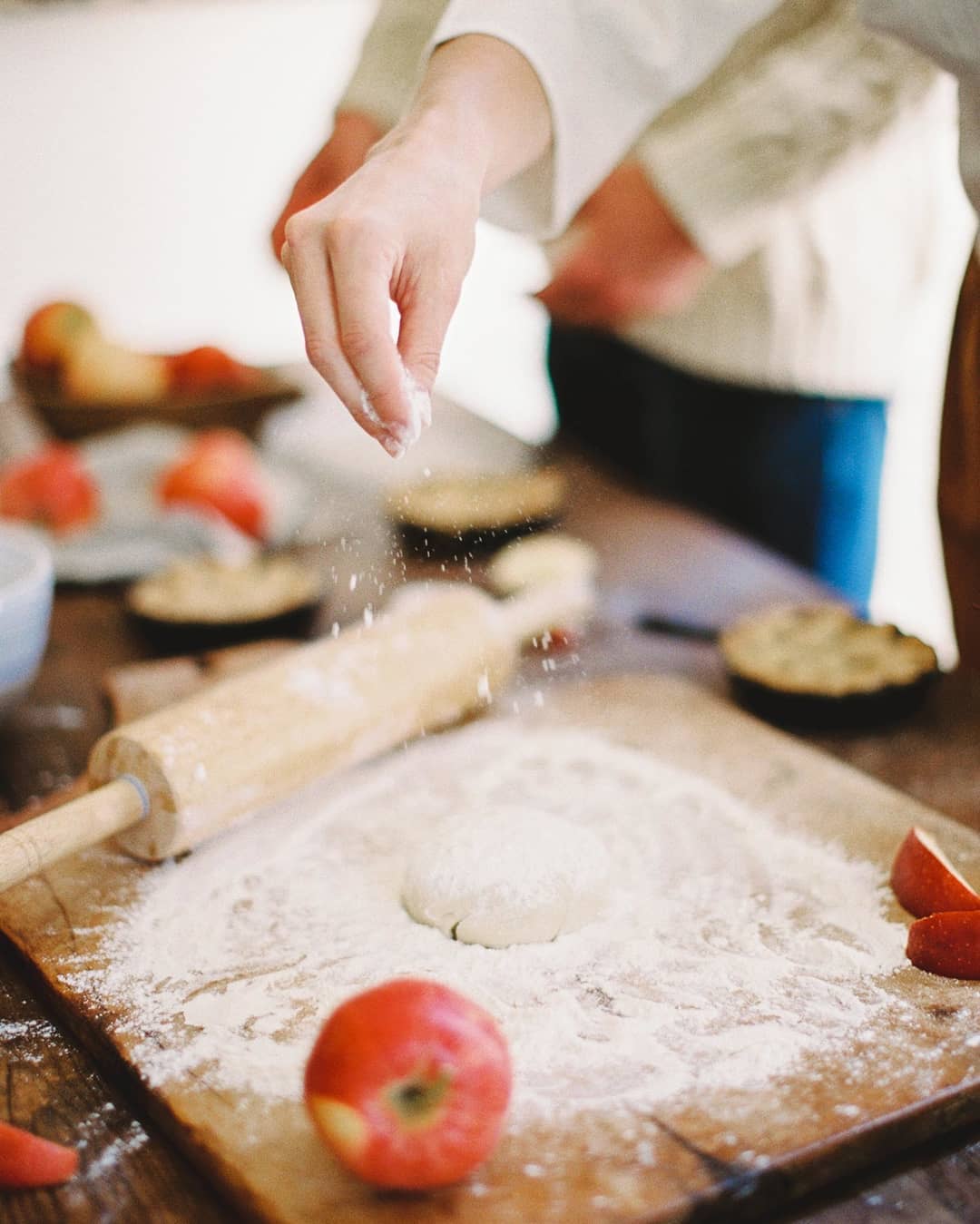 autumn engagement session making apple pies