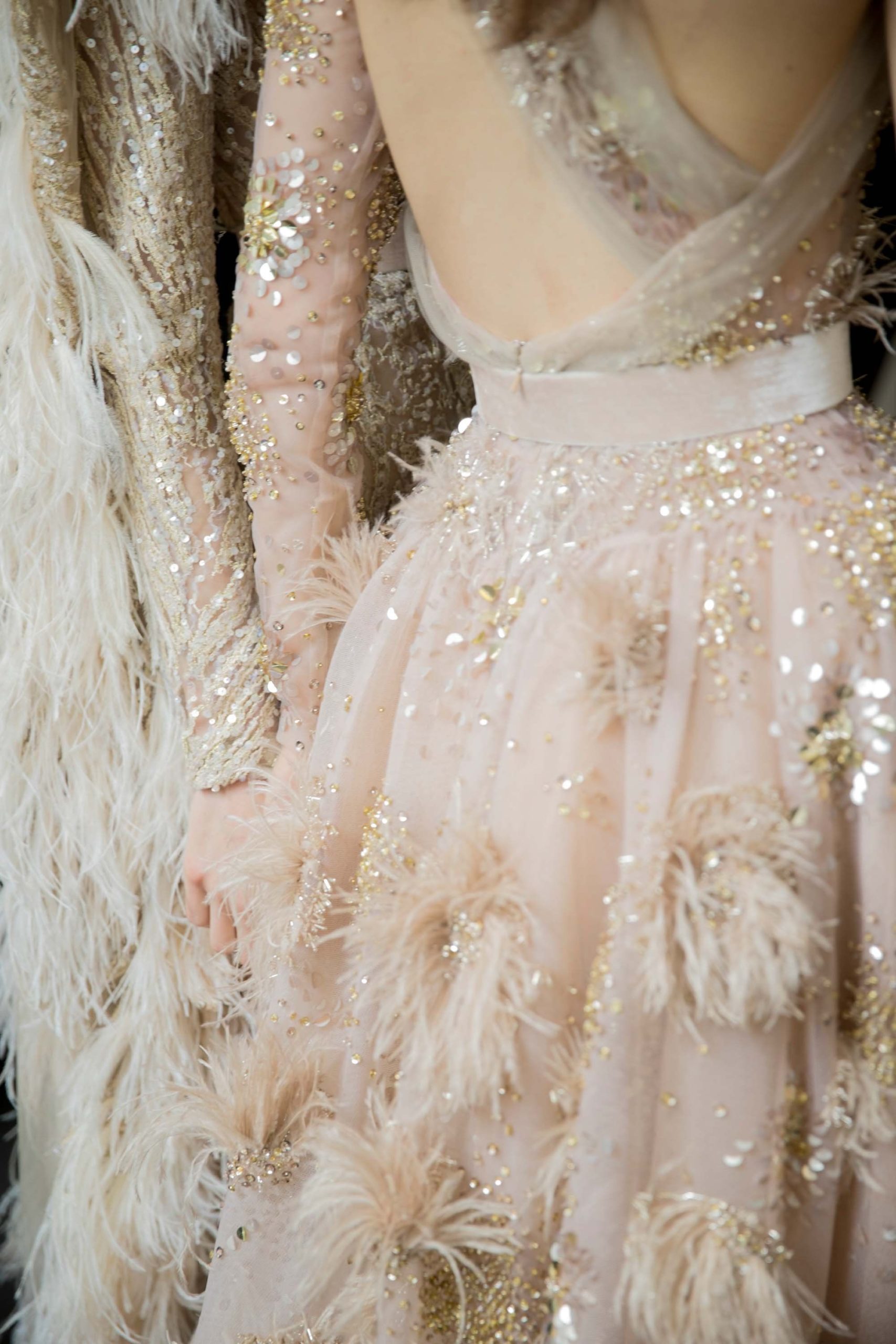 Today we're talking all about texture and design in the scope of wedding planning, and these haute couture wedding dresses by Elie Saab with ostrich feather accents are the picture perfect example of why this design element makes all the difference in the world #hautecouture #eliesaab #runwayinspiration // Willow & Oak Events