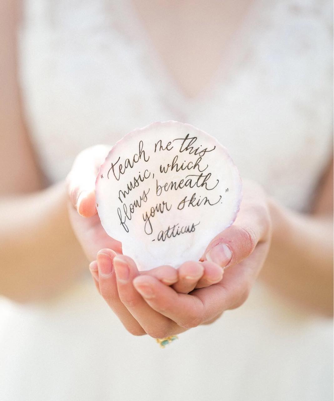 Atticus love quote calligraphed on a seashell for an Old World coastal wedding inspiration in Dorset, England | Calligraphy by Dominique Alba, design by Willow and Oak Events and photography by Anneli Marinovitch
