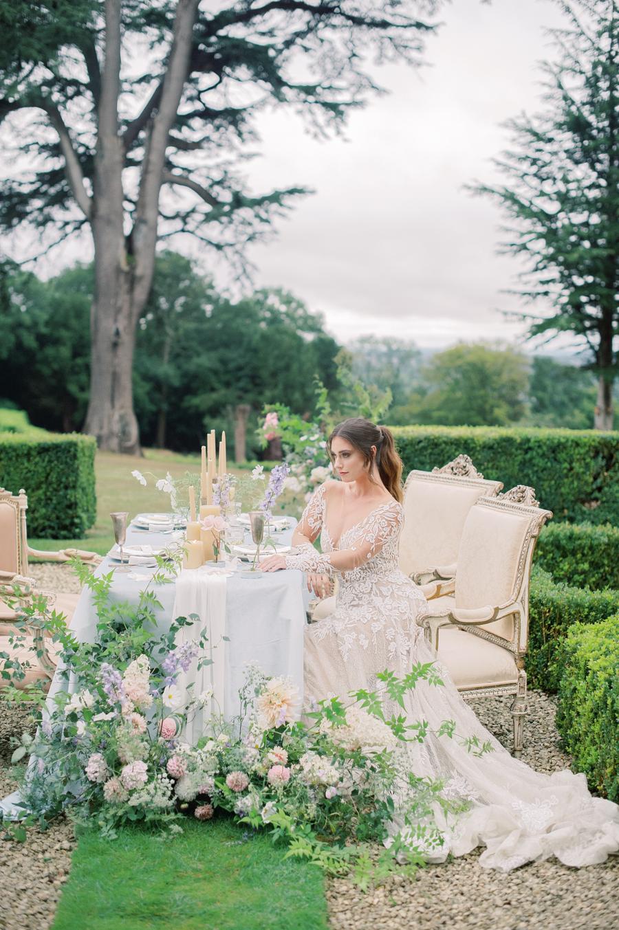 European garden wedding with an al fresco reception, luxury bridal gowns and over-the-top garden flowers || Photo by Julie Livingston with planning + design by Willow and Oak Events