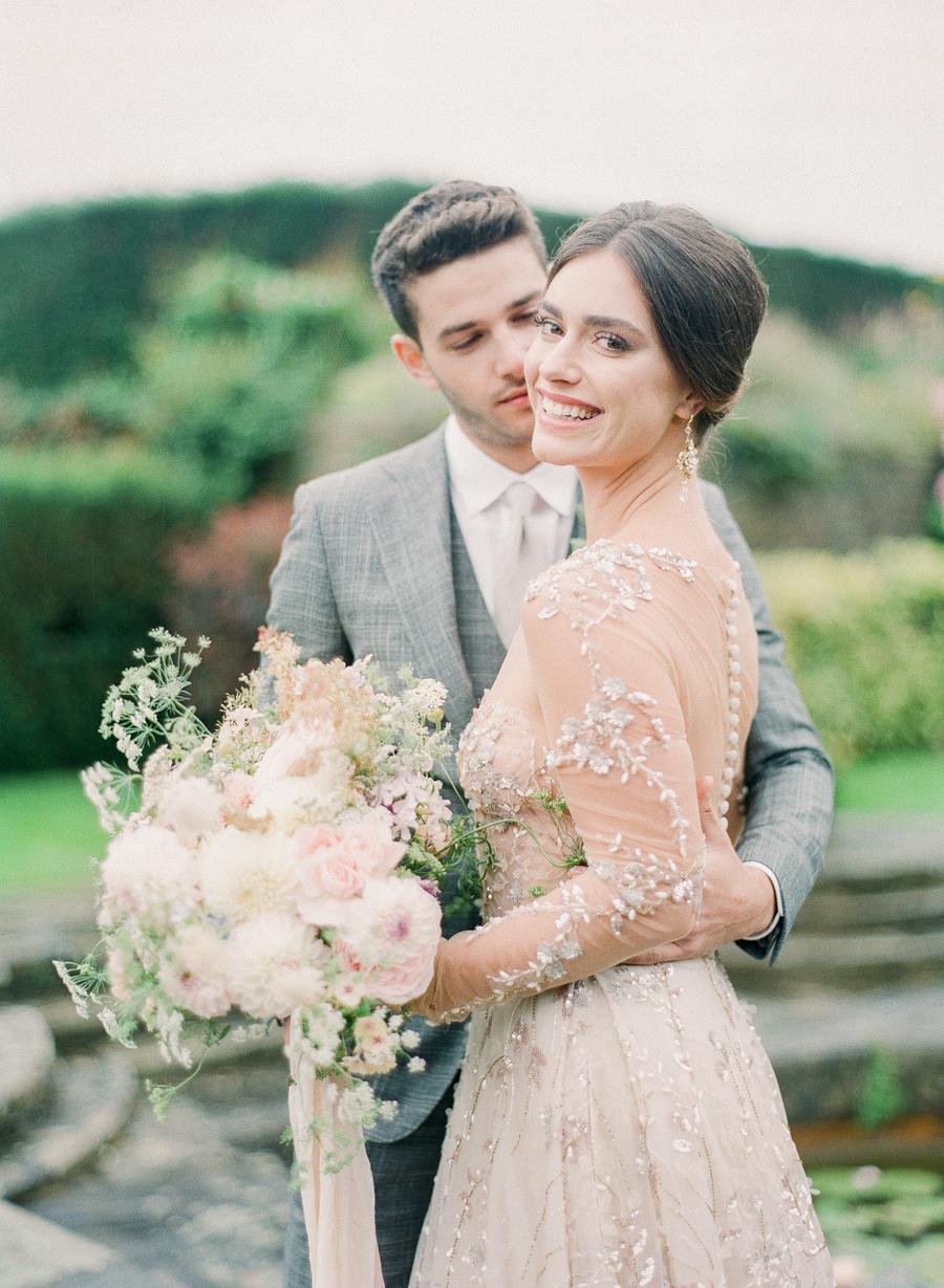 Luxury English garden wedding with a Lee Petra Grebenau bridal gown and crystal chandelier drop earrings from Sibo Designs || Photography by Julie Livingston with planning + design by Willow and Oak Events