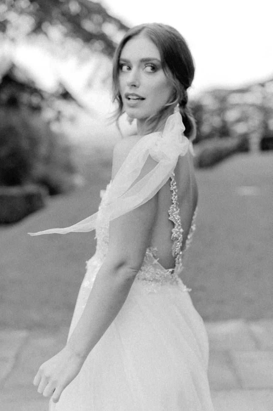 Romantic English garden wedding inspiration at a historic European estate with an Inbal Dror gown, organic pastel flowers by Moss & Stone and an oversized sun hat || Photography by Julie Livingston with design + planning by Willow and Oak Events