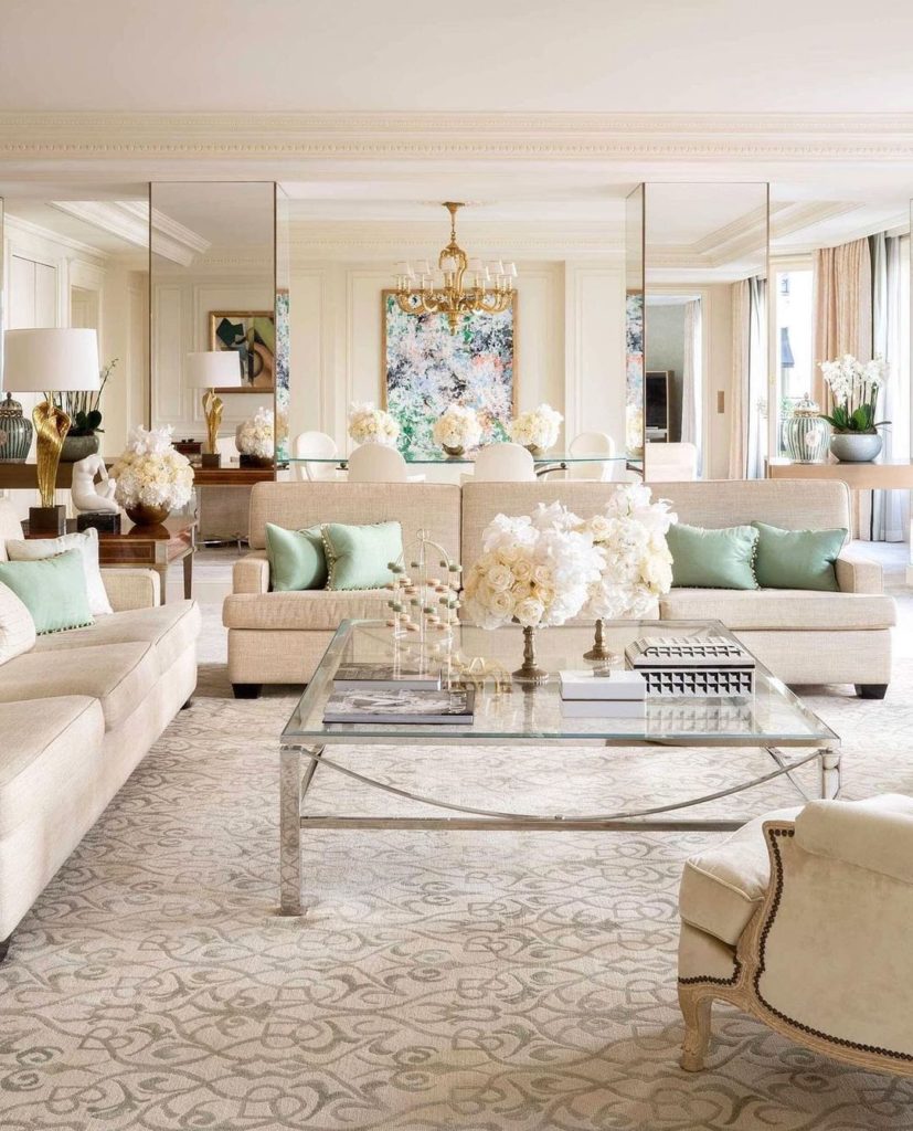 A chic cream and robin's egg blue palette fills the Royal Suite at Four Seasons Hotel George V Paris