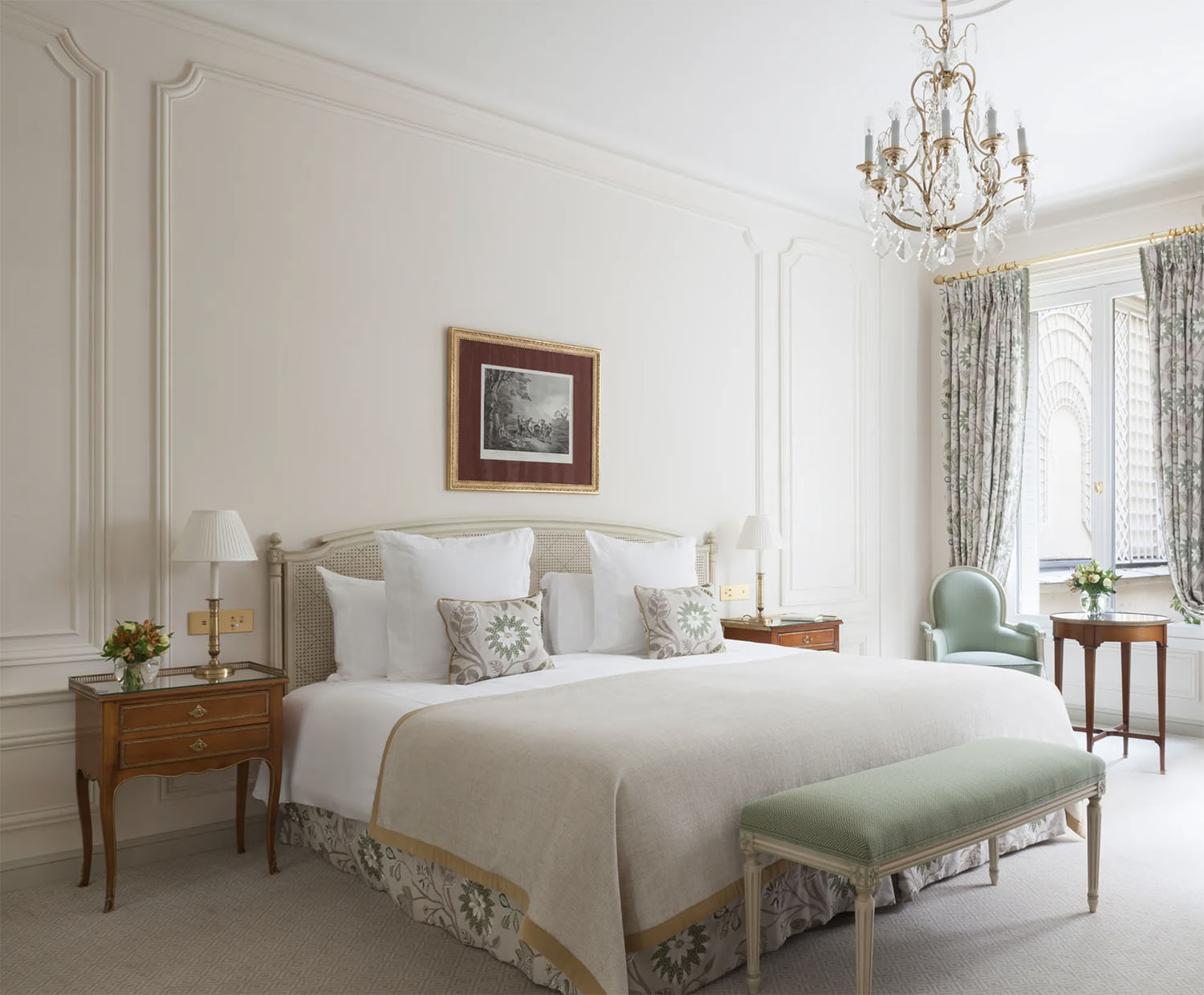 A muted palette room at Le Bristol Paris with classic furniture and spacious interiors