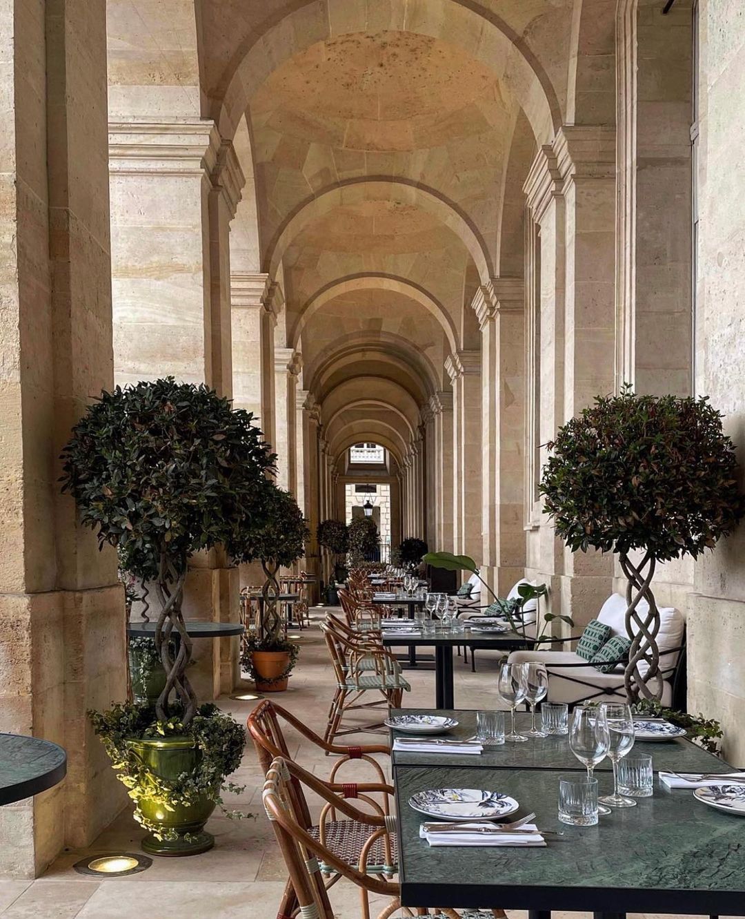 The vaulted galerie with seating for Café Lapérouse