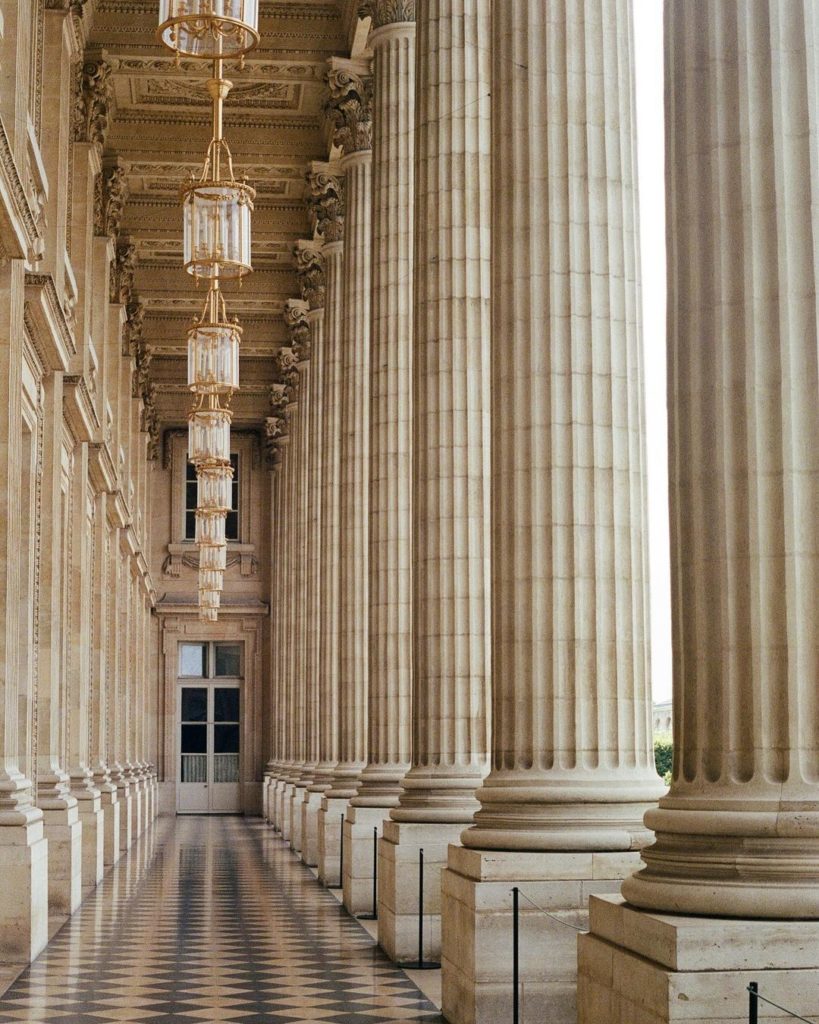 The grand columned passageway of Hotel de la Marine